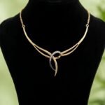 Golden Infinity Knot Necklace